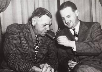 Babe Ruth Smoking Cigar with Benson Ford photograph, 1947 April 07