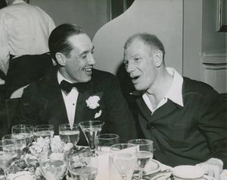 Bob Feller in Conversation with Bill Veeck photograph, possibly 1949
