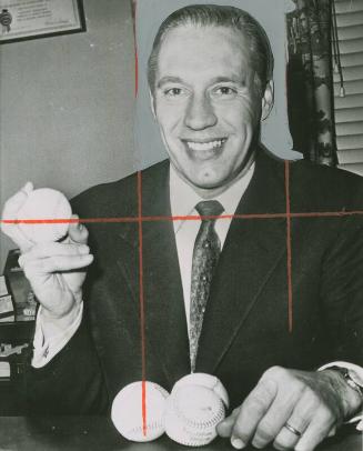 Bob Feller Sitting at Desk photograph, 1961