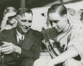 Bob Feller with Father photograph, 1936 October 10
