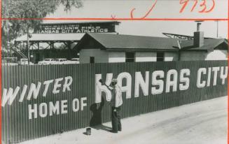 Workman Painting Kansas City Athletics Sign photograph, 1964 February 21