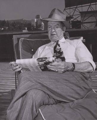 Grover Cleveland Alexander Reading Newspaper photograph, 1949 October 31