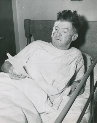 Grover Cleveland Alexander in Hospital Bed Reading photograph, 1946