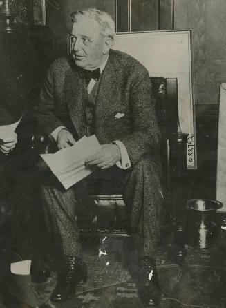 Charles Comiskey Sitting in Chair photograph, 1920
