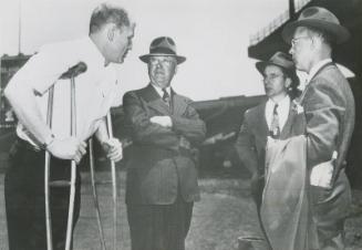Tommy Connolly, Bill Veeck, Rudy Schaffer, and Earl J. Hilligan photograph, 1947 May 22