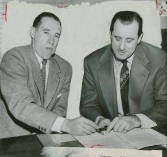 Bob Feller Signing Contract with Hank Greenberg photograph, 1955 January