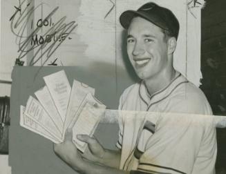 Bob Feller Fans Out Insurance Policies photograph, probably 1941