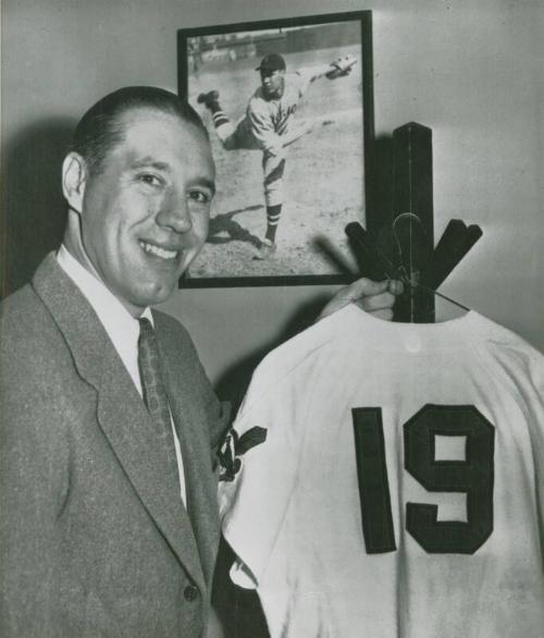 Bob Feller Hanging Up Uniform photograph, 1956 December 28