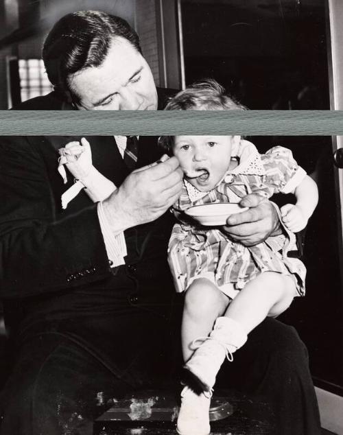 Babe Ruth Feeding Child Ice Cream photograph, 1941 December 12