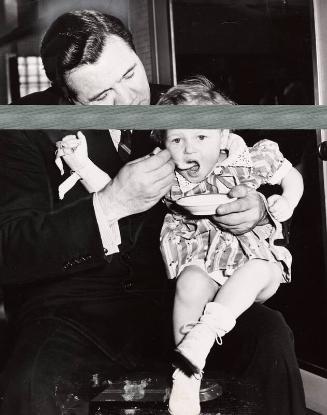 Babe Ruth Feeding Child Ice Cream photograph, 1941 December 12