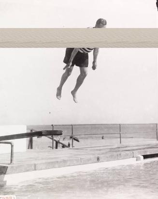 Babe Ruth Jumping Off Diving Board photograph, 1930