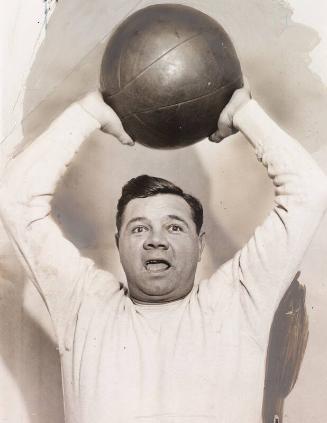 Babe Ruth with Medicine Ball Over His Head photograph, 1932 December 23