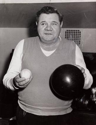 Babe Ruth Holding a Baseball and Bowling Ball photograph, undated