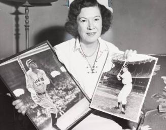 Claire Ruth holding Babe Ruth and Mickey Mantle Photographs photograph, 1956 August 16