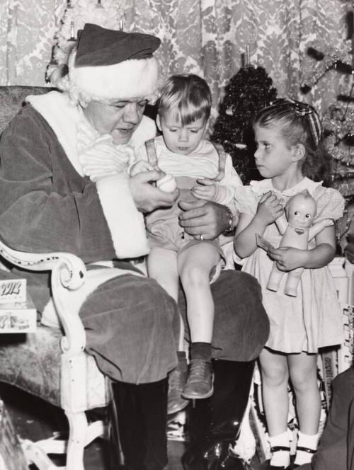 Babe Ruth Dressed as Santa with Children photograph, 1947 December 10