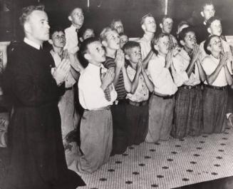 Boys of St. Mary's Praying for Babe Ruth photograph, 1948 August 12