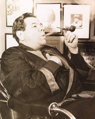 Babe Ruth Smoking Pipe photograph, undated