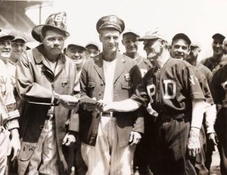 Babe Ruth and Lou Gehrig Dressed as Firefighter and Policeman photograph, undated