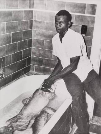 Satchel Paige with a Fish photograph, 1952 June 28