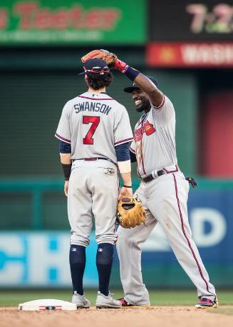 Brandon Phillips and Dansby Swanson Celebrating photograph, 2017 June 14