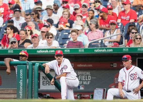 Jacque Jones, Mike Maddux, and Chris Speier Standing in the Dugout photograph, 2017 June 11