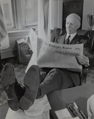 Connie Mack Reading Newspaper photograph, 1945 November 28