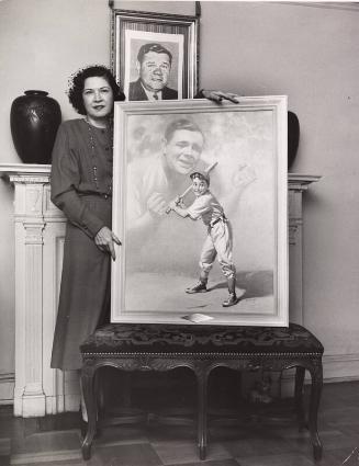 Claire Ruth Posing with "C'mon Kid" Painting photograph, undated
