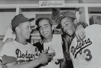 Sandy Koufax, Maury Wills, and Willie Davis Group photograph, 1965 October 11