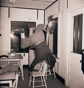 Paul Waner Balancing on Chair negative, 1945 February 01