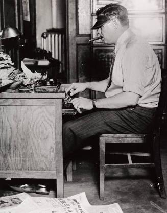 Babe Ruth Using Typewriter photograph, undated