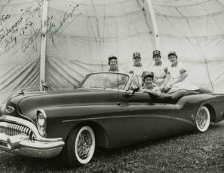 Grand Rapids Chicks Players in a Buick photograph, 1953 July