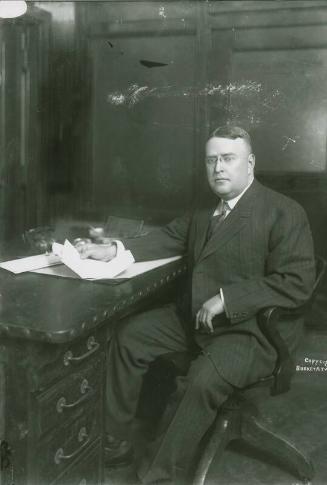 Ban Johnson Seated at Desk photograph, undated