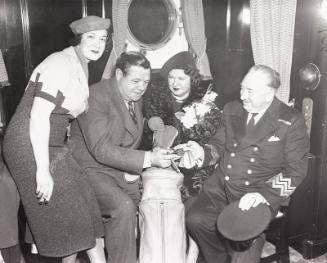 Babe and Claire Ruth with Unidentified Friends on Cruise photograph, 1938 February 20