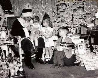 Babe Ruth Dressed as Santa for Children photograph, 1947 December 11