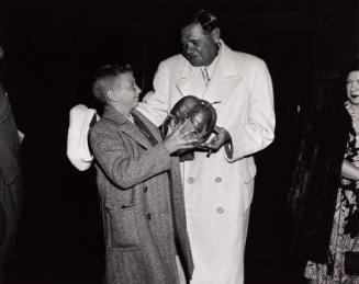 Babe Ruth with a Young Boy photograph, 1948 March 28
