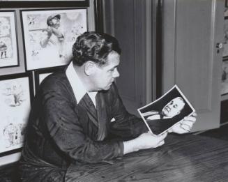 Babe Ruth Holding a Photograph of Jacob Ruppert photograph, 1939 January 14