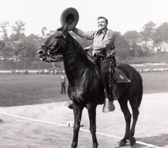 Babe Ruth Riding a Horse Dressed as a Cowboy photograph, 1928 October 12