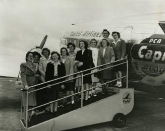 Grand Rapids Chicks Players with Capital Airlines Plane photograph, 1947