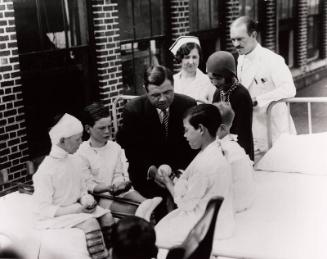 Babe Ruth Visiting Four Young Boys in Hospital photograph, undated
