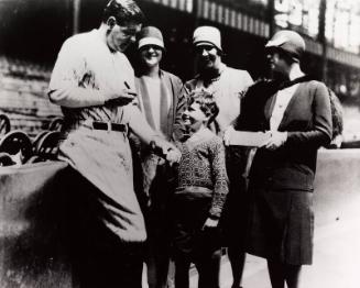 Babe Ruth Signing Baseball photograph, between 1920 and 1934